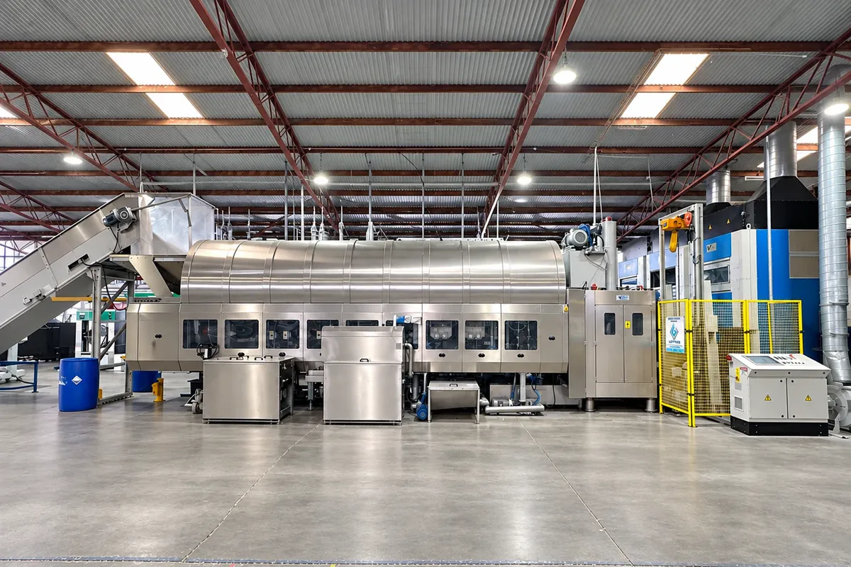 The industrial tunnel washing line inside the eWASH Moorabbin laundry