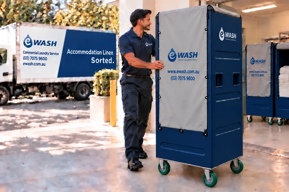 Illustration of an eWASH linen delivery with a driver, truck and covered linen cart